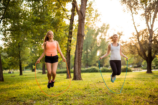 Friends doing fitness in the park.