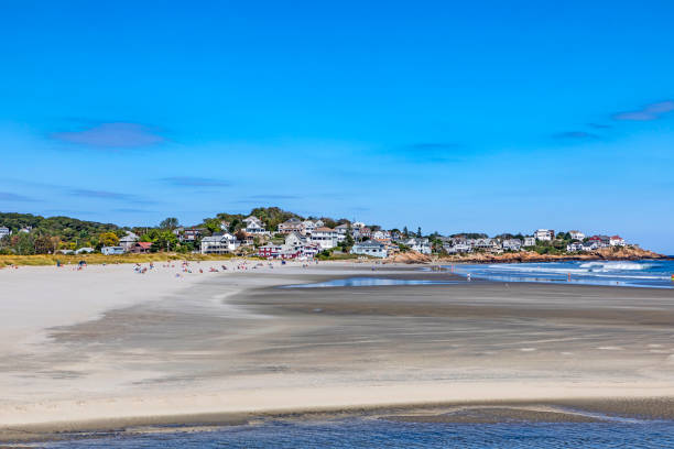 istock gloucester beach with village at horizon 857565956