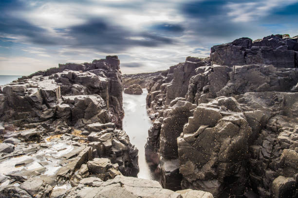 istock The Black Hole at Craster, Northumberland. 857569734