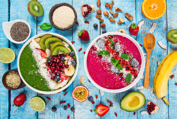 istock Smoothie bowl with fresh berries, nuts, seeds, fruit and vegetables 857578360