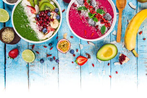 istock Smoothie bowl with fresh berries, nuts, seeds, fruit and vegetables 857578448