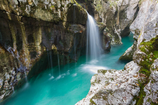 River canyon Small waterfall in Soca river canyon. slovenia photos stock pictures, royalty-free photos & images