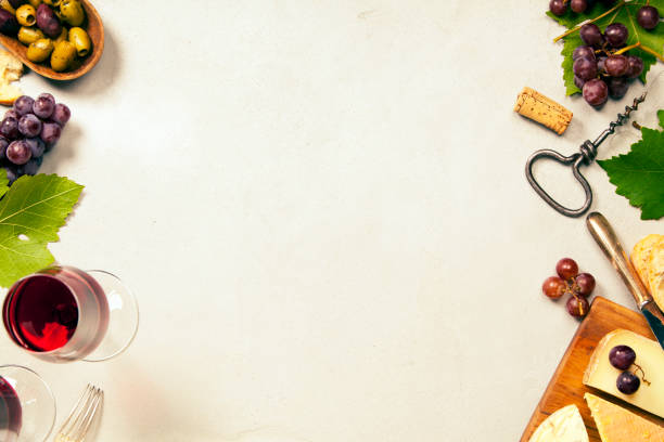 istock Wine appetizers set: French cheese selection, grapes and walnuts on concretebackground 857582370