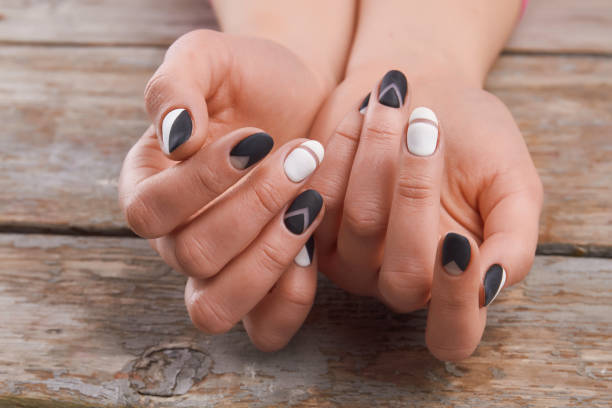 istock Cute manicure on female hands. 857585952