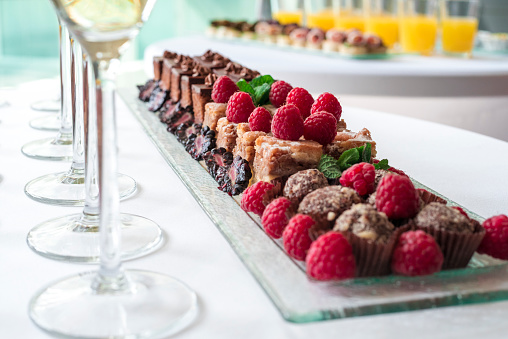 Party buffet with champagne and desserts