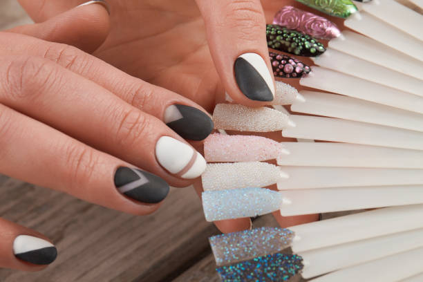 istock Fashion nail art samples in female hands. 857586162