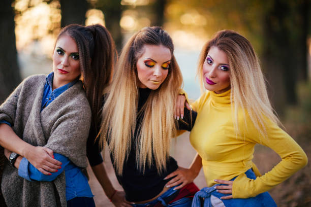 istock Charming girls in park 857591852