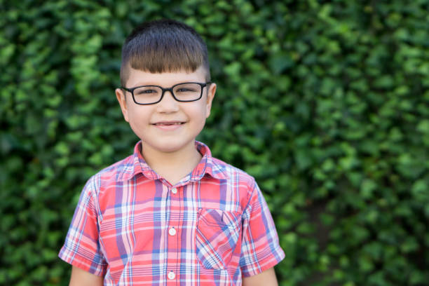 istock Happy school kid boy with glasses 857596038