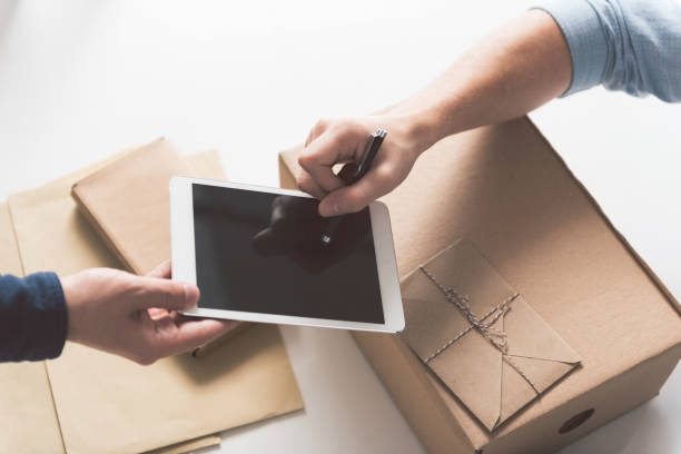 istock Male is confirming receipt of his order 857608656