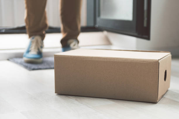 istock Paper sending box locating on ground 857608836