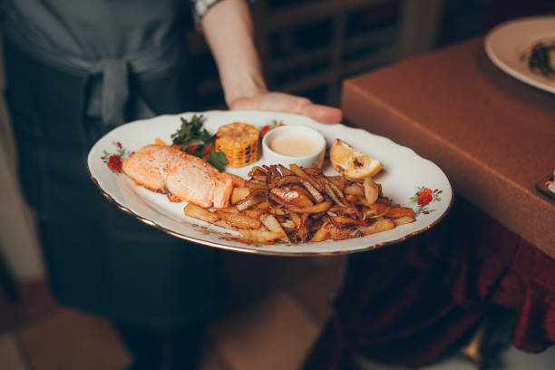 istock hot meals and salads in the hands 857608896