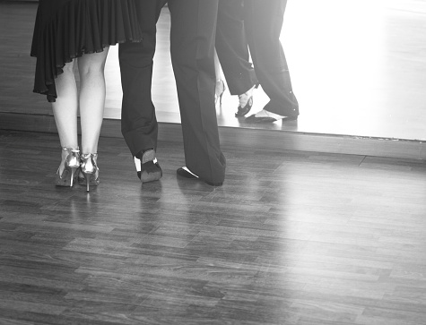 A view of a couple dancing a tango dance.