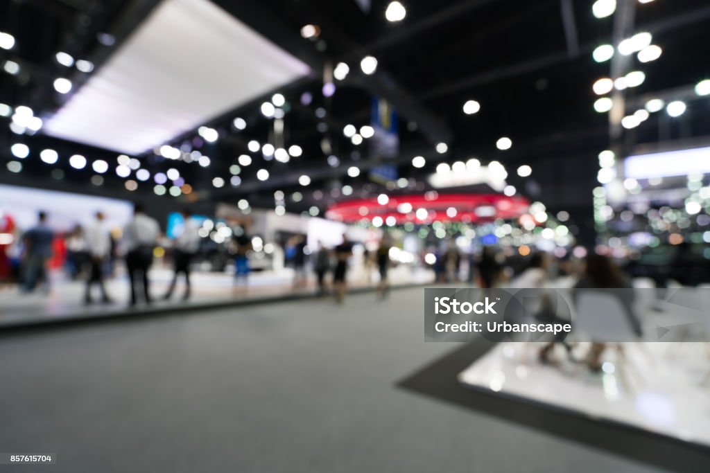 Blurred, defocused background of public event exhibition hall. Business trade show or commercial activity concept Exhibition Stock Photo