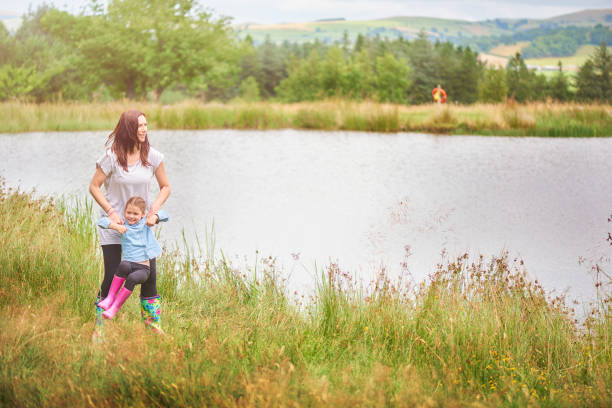 istock mother and daughter on a countryside walk 857615832