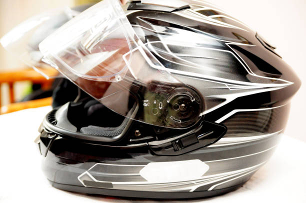 istock Sports moto helmet half isolated on table 857617868