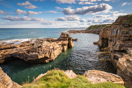 At Rumbling Kern near Howick on the Northumberland coastline lies a small beach and cove, sheltered by small cliffs