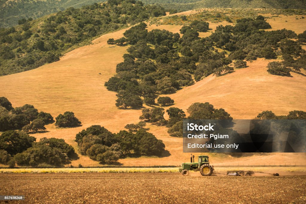 tractor-machine-plows-the-fertile-farm-land-stock-photo-download