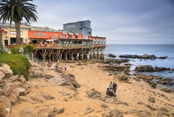 Playas de Tijuana, Mexico, December 27 - The promenade and the houses in Tijuana Beach (Playas de Tijuana) near the border wall between Mexico and United States, on the Pacific Mexican Coast, in the Baja California State.