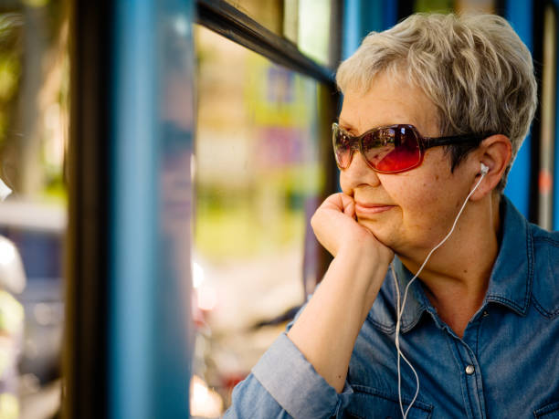 Senior woman in tram