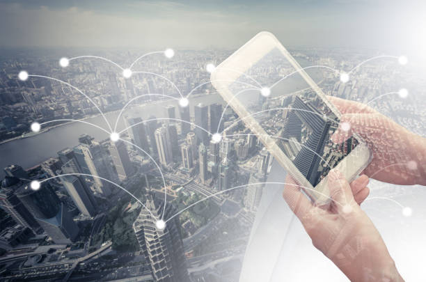 istock Young woman holding smartphone in hand while typing 857624104
