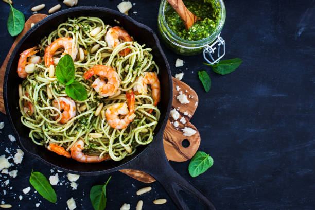 istock Spaghetti with prawns and homemade pesto sauce 857631638