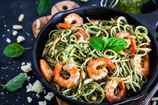istock Spaghetti with prawns and homemade pesto sauce 857631674