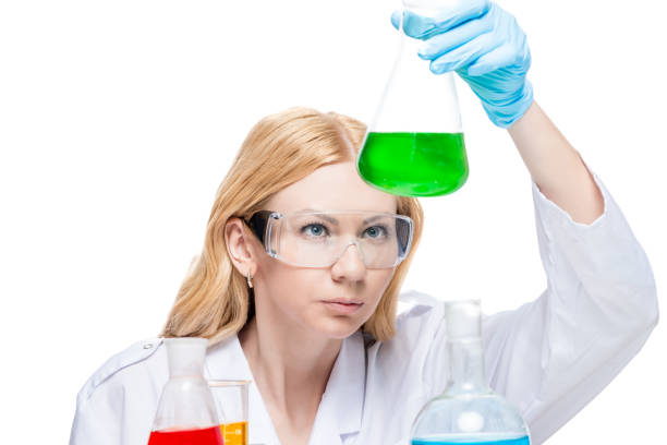 istock Concentrated chemist with test tubes working in the laboratory, portrait isolated 857638736