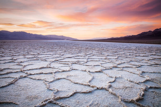 Badwater Sunset in Badwater, Death Valley National Park. Badwater is the lowest point in the USA, located in Death Valley National Park, California. death valley desert photos stock pictures, royalty-free photos & images
