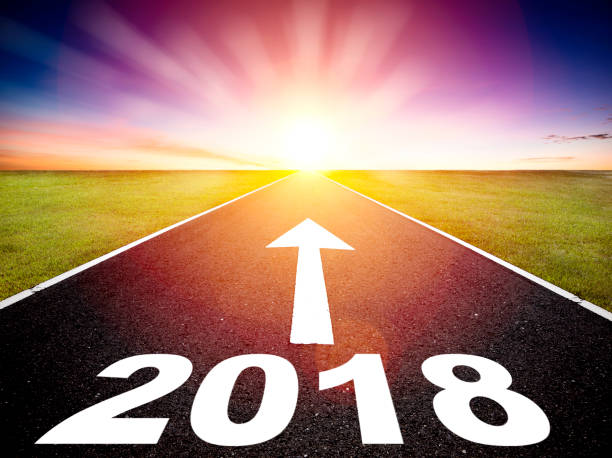 istock Driving on an empty road and happy new year 2018 concept 857645752