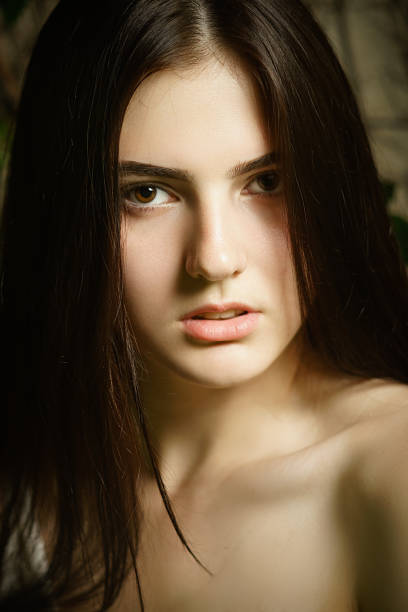 istock Beautiful young woman portrait 857649130