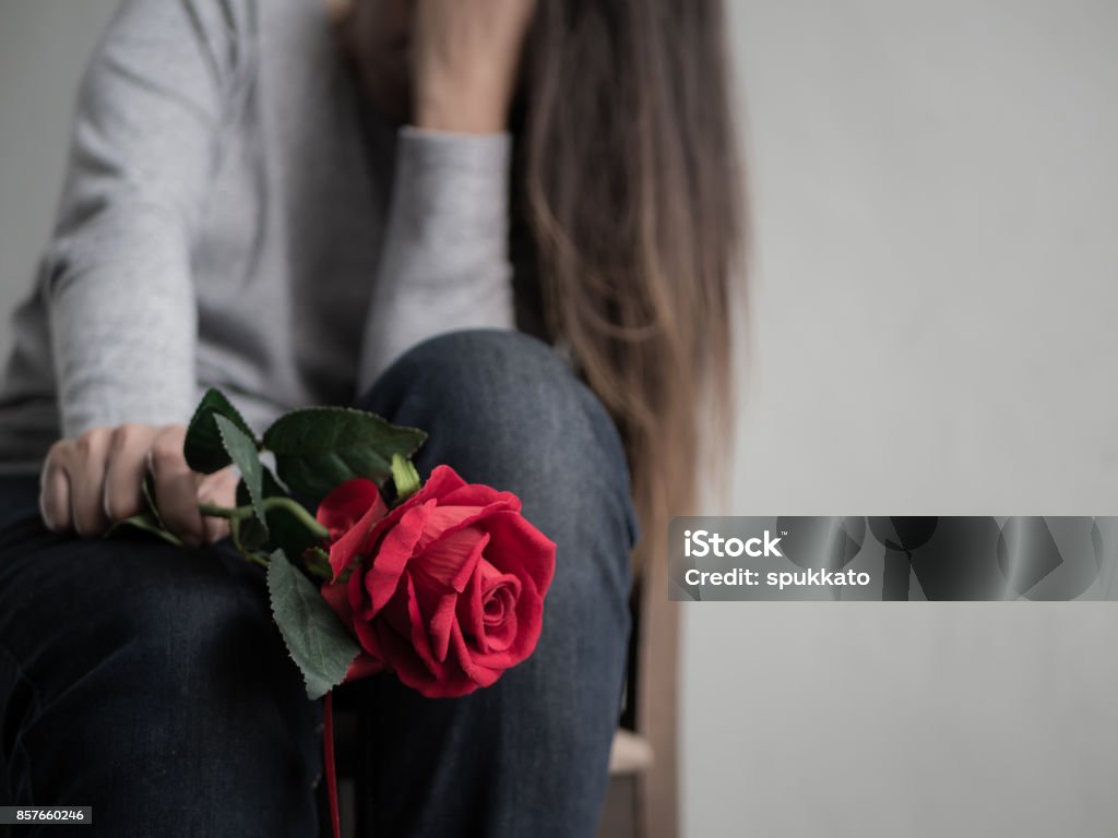 Sad Woman Sitting And Crying With Red Rose In Her Hand Lonly Love ...