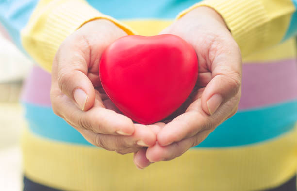 istock Hands women giving red heart 857668146