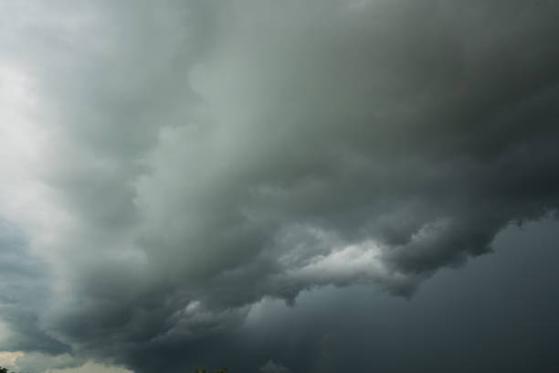 istock Black cloud and thunderstorm before rainy, Dramatic  black clouds and dark sky 857670678