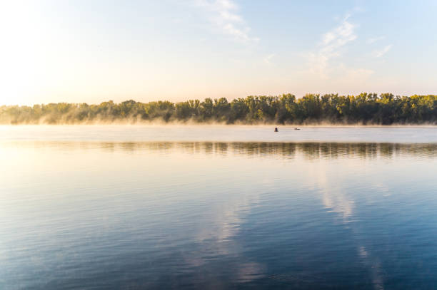istock Misty autumn dawn over the river 857688860
