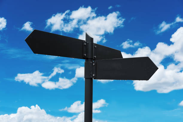 istock Blank road signpost, on blue sky and white clouds background 857692140