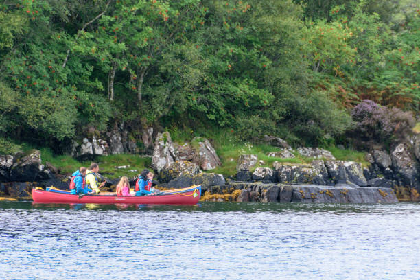 family in a kayak in gairloch harbor, scotland - loch rowboat lake landscape imagens e fotografias de stock
