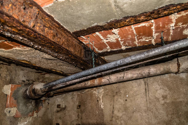 istock Old rusty steel structure and drainage pipes 857699808