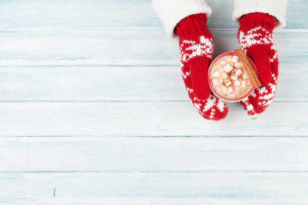 istock Female hands holding hot chocolate 857701560