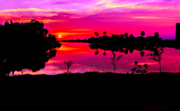 istock Beautiful sunset behind the pond. 857725328