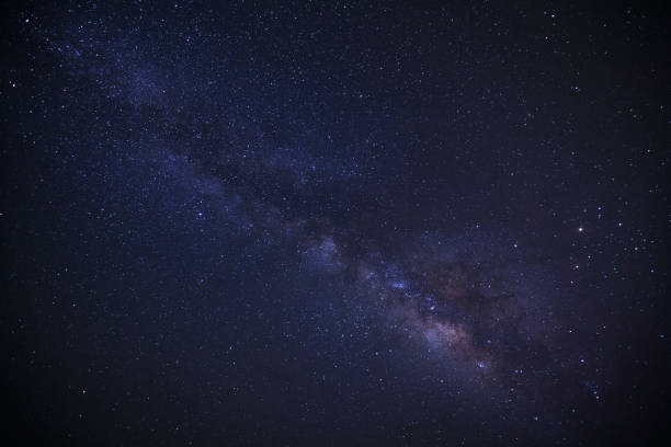 istock learly milky way galaxy at phitsanulok in thailand. Long exposure photograph.with grain 857731702