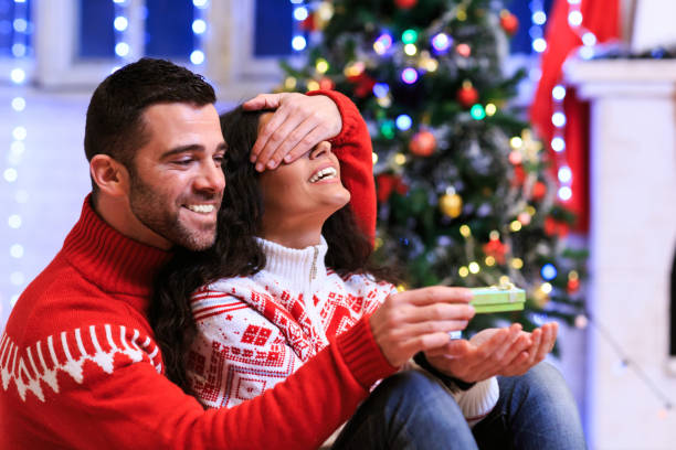 Couple having fun at home for Christmas