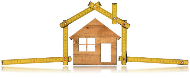 istock Model House and Wooden Folding Ruler 857739062