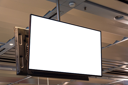 Blank ad space screen hanging from the ceiling close up