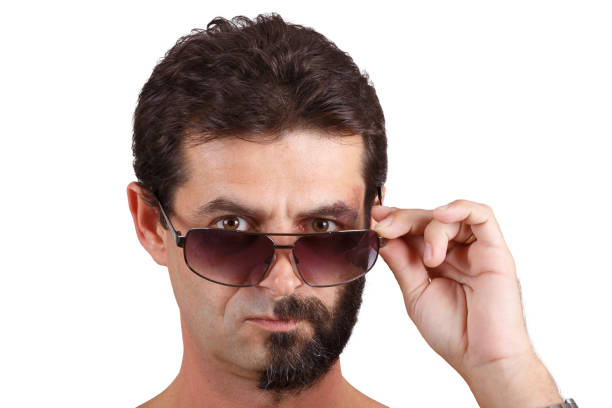 istock portrait of man with half shaved face 857747154