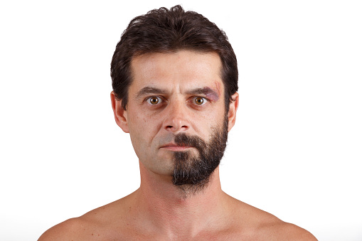 split personality - portrait of man with half shaved and unshaven face