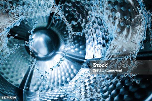 Water Splash Of The Washing Machine Drum Stock Photo - Download Image Now - Laundry, Laundromat, Machinery