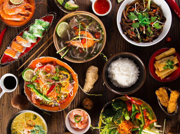 istock Various of asian meals on rustic background , top view , place for text 857760210