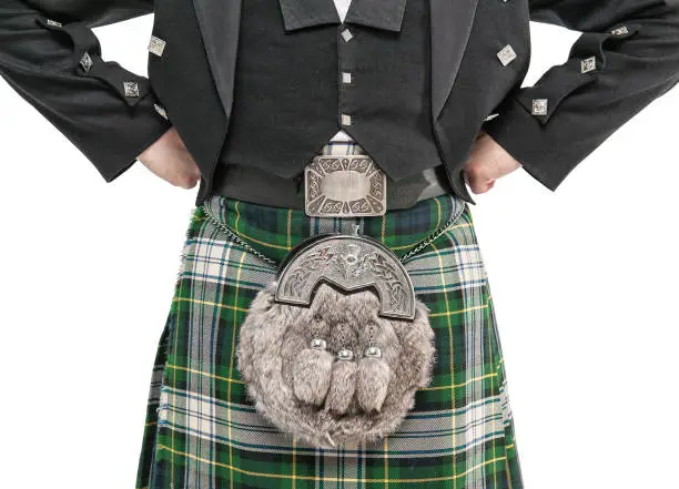 Man torso in traditional Scottish costume isolated