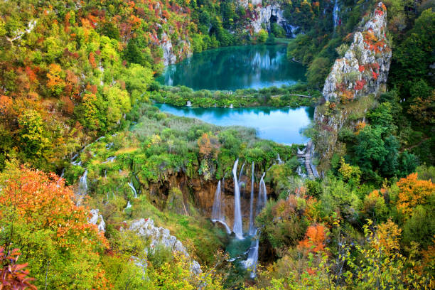istock Autumn Landscape With Lakes and Waterfall 857768808