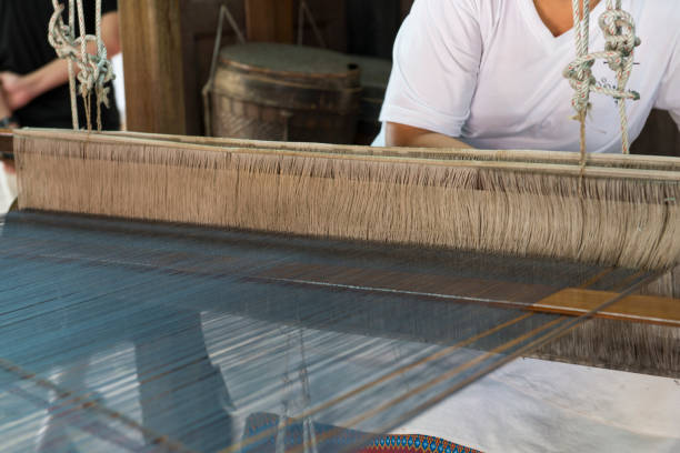 istock Thai traditional weaving loom. Thai silk. 857777644